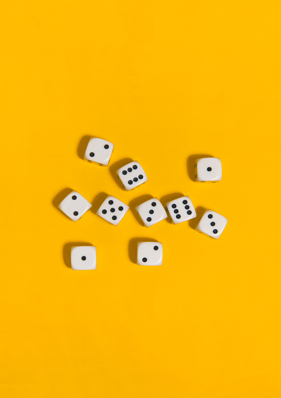 Black-and-white dices on a yellow background / Pop art style photo print