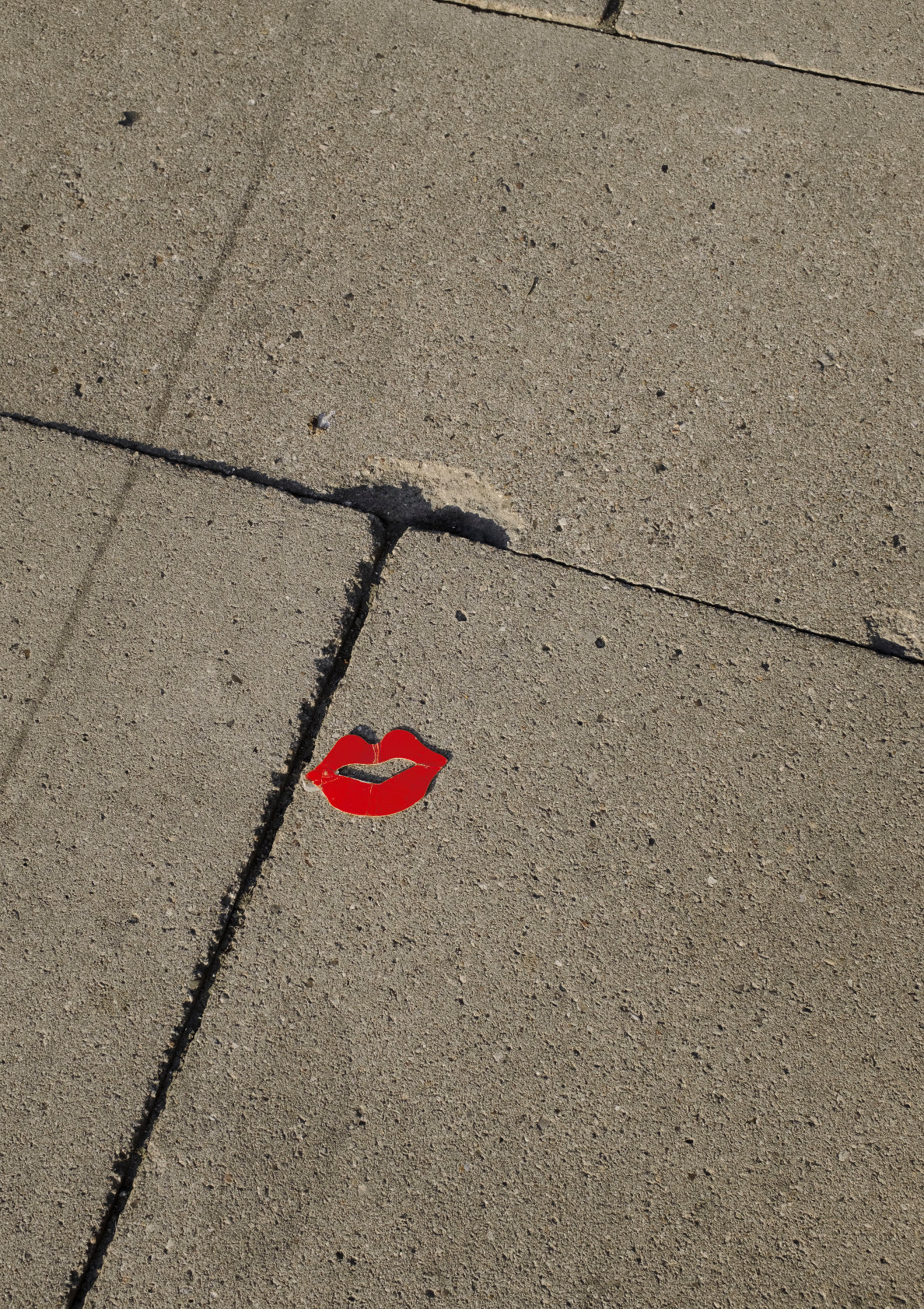 Classic red kiss on a sidewalk / pop art style lips photo print