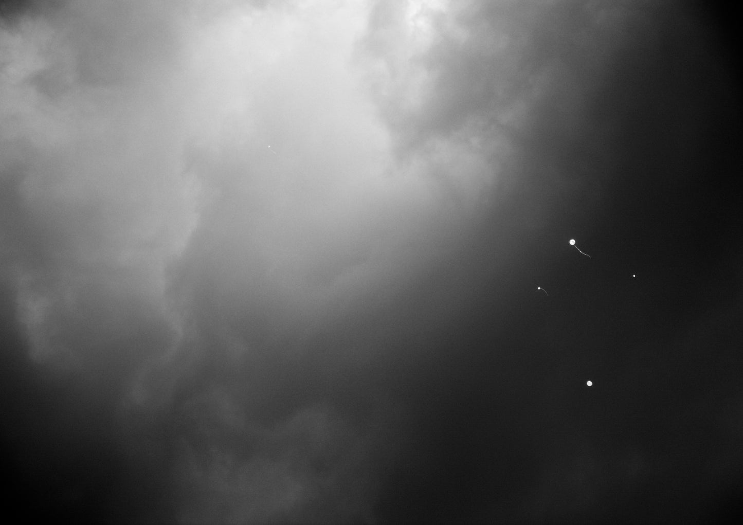 Four balloons and another one