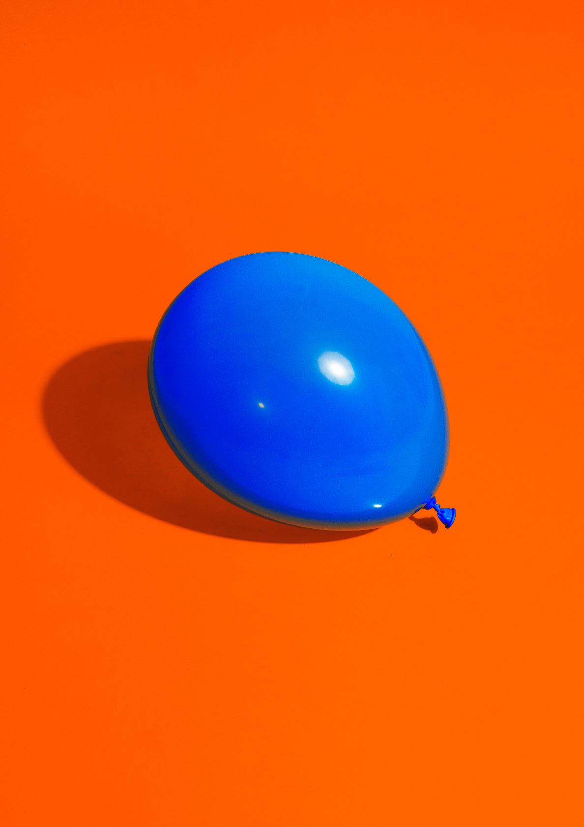 Royal blue balloon on a red background / Pop art style photo print