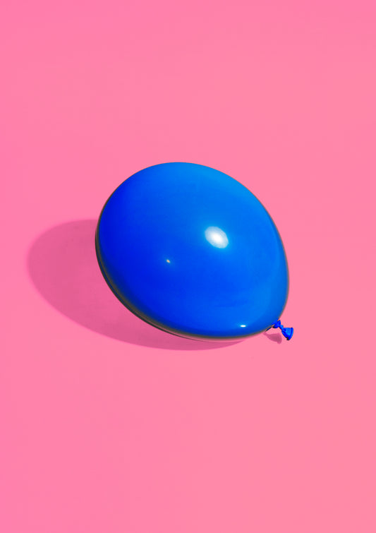 Royal blue paper balloon on a pink background / Pop art style photo print