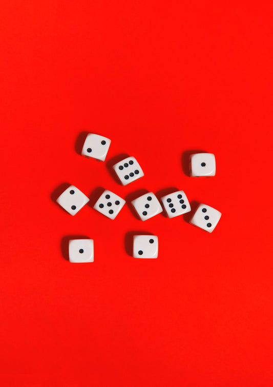 Black-and-white dices on a red background / Pop art style photo print