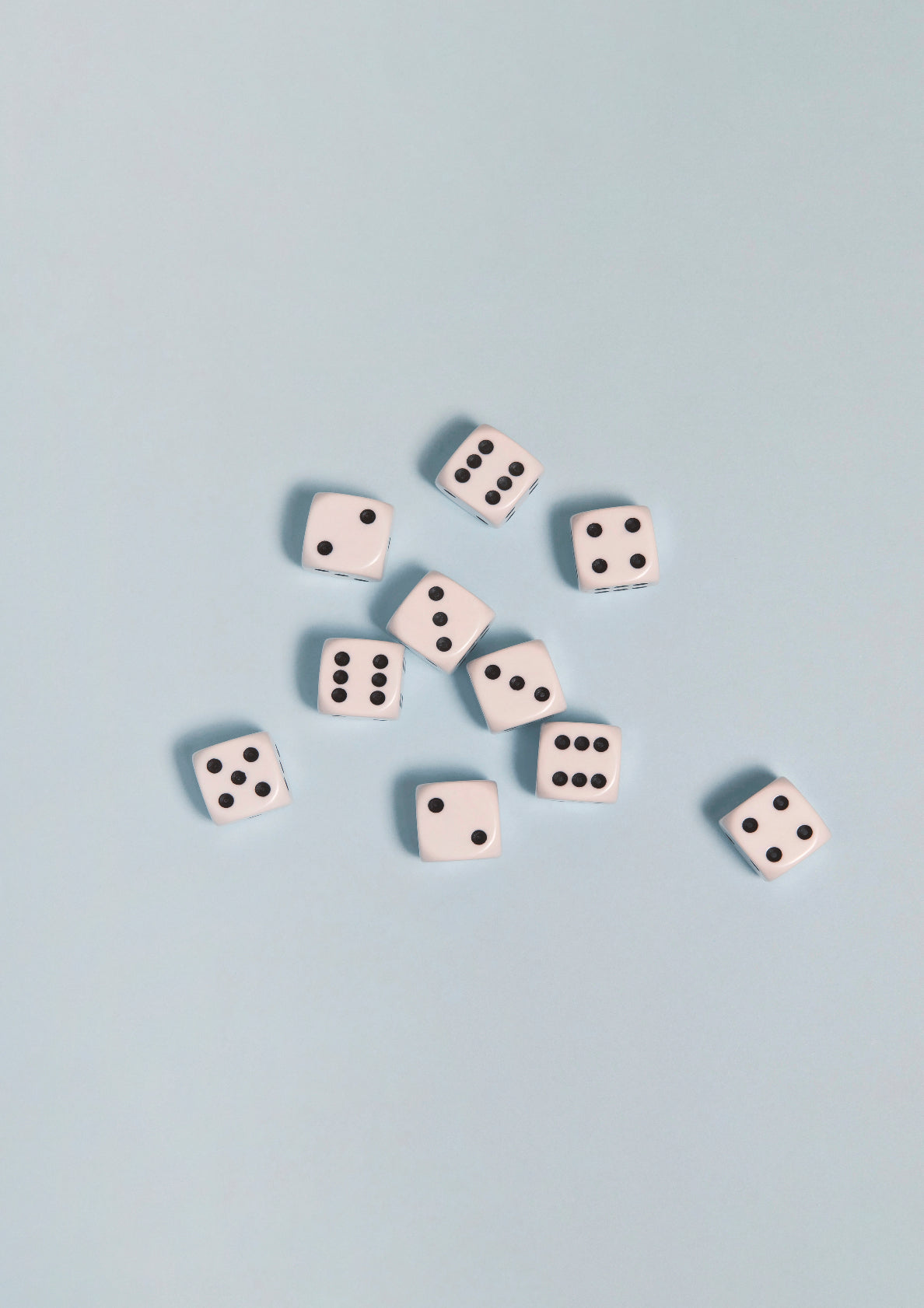 Black-and-white dices on a light blue background / Pop art style photo print