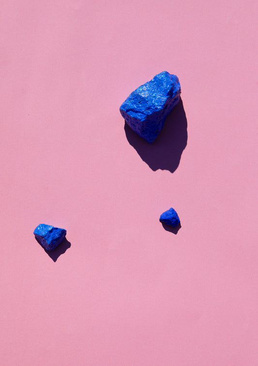 Coloured painted stones on a coloured background / Pop art style photo print