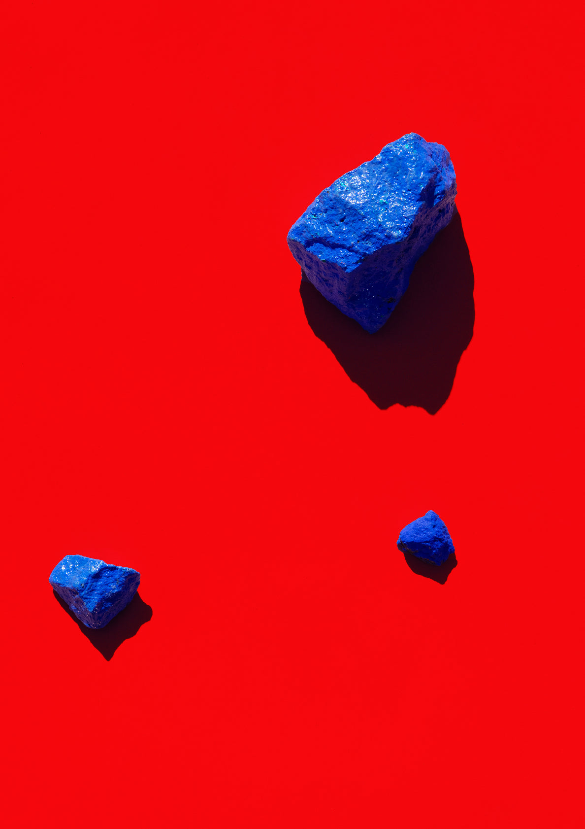 Coloured painted stones on a coloured background / Pop art style photo print