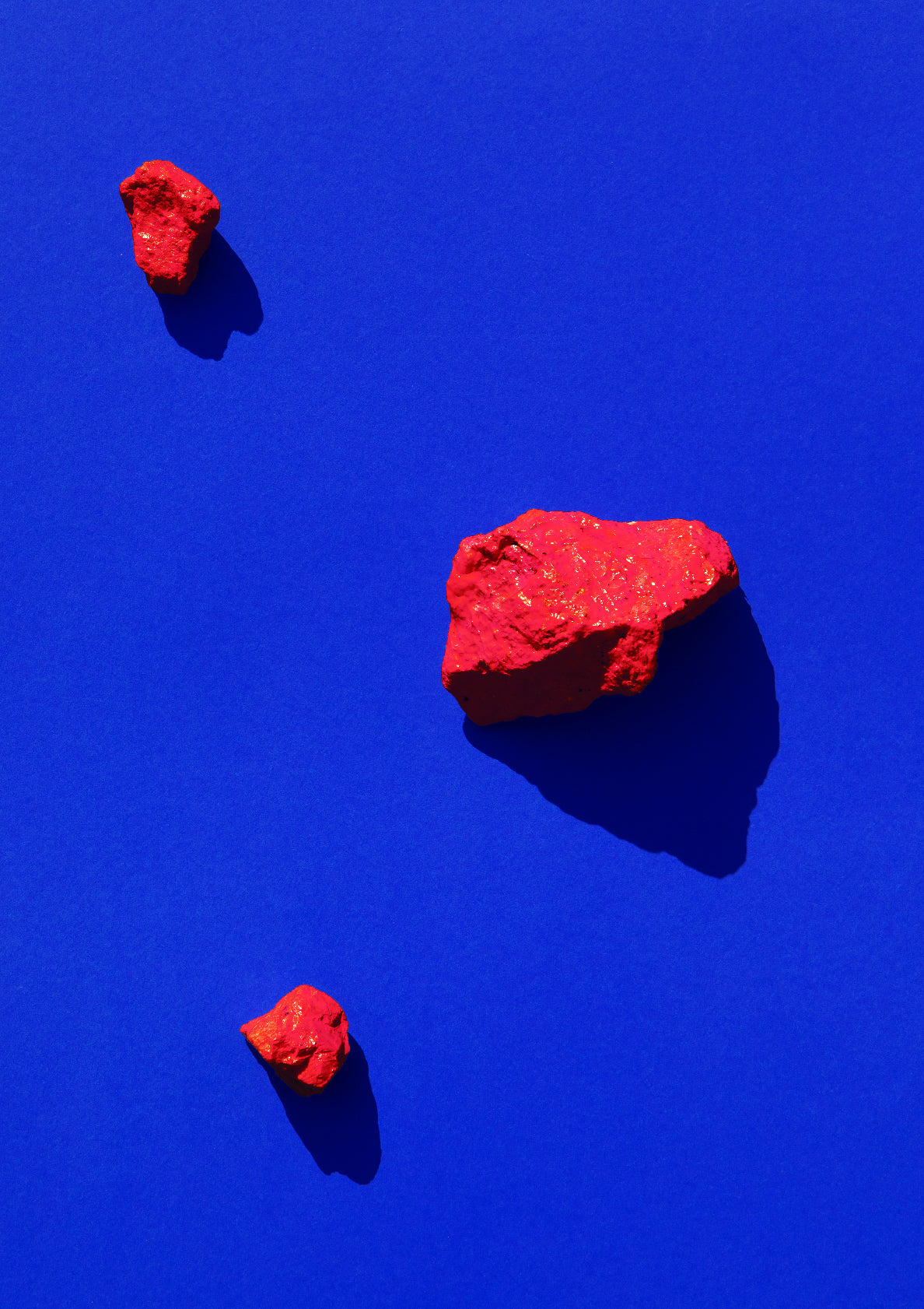 Coloured painted stones on a coloured background / Pop art style photo print