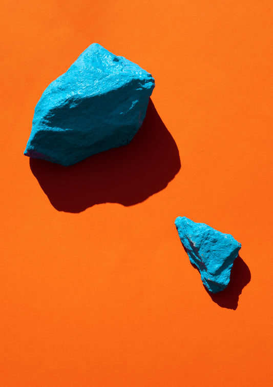 Coloured painted stones on a coloured background / Pop art style photo print