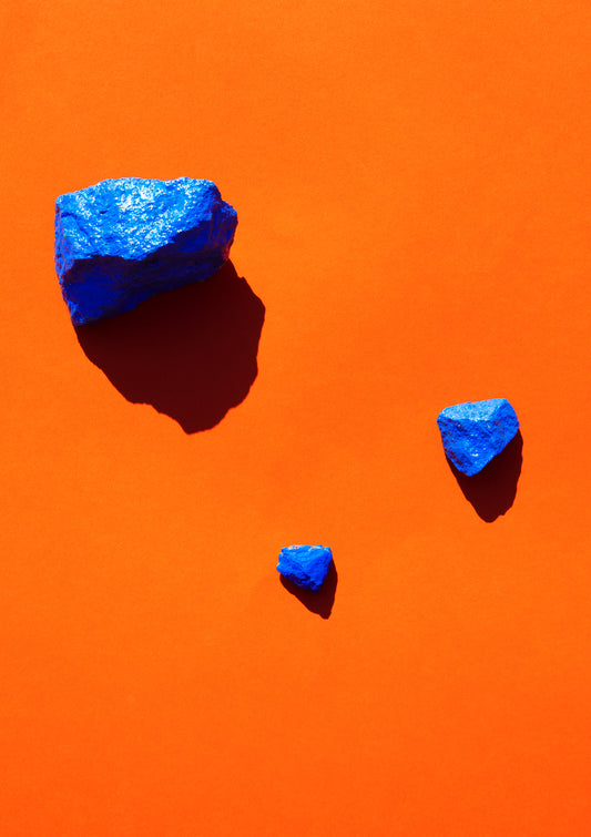 Coloured painted stones on a coloured background / Pop art style photo print