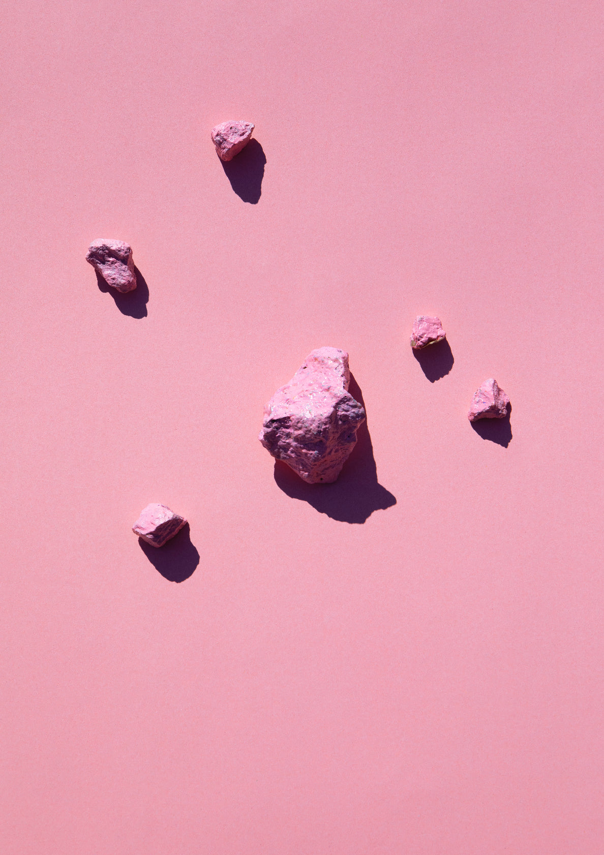 Coloured painted stones on a coloured background / Pop art style photo print