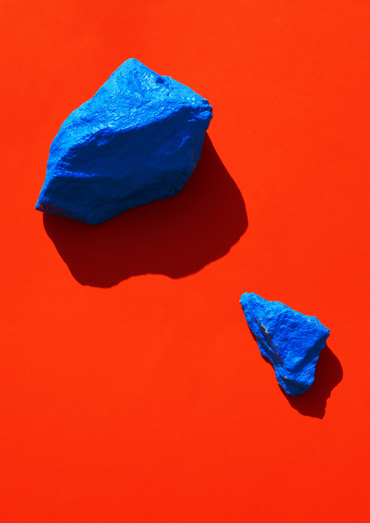 Coloured painted stones on a coloured background / Pop art style photo print