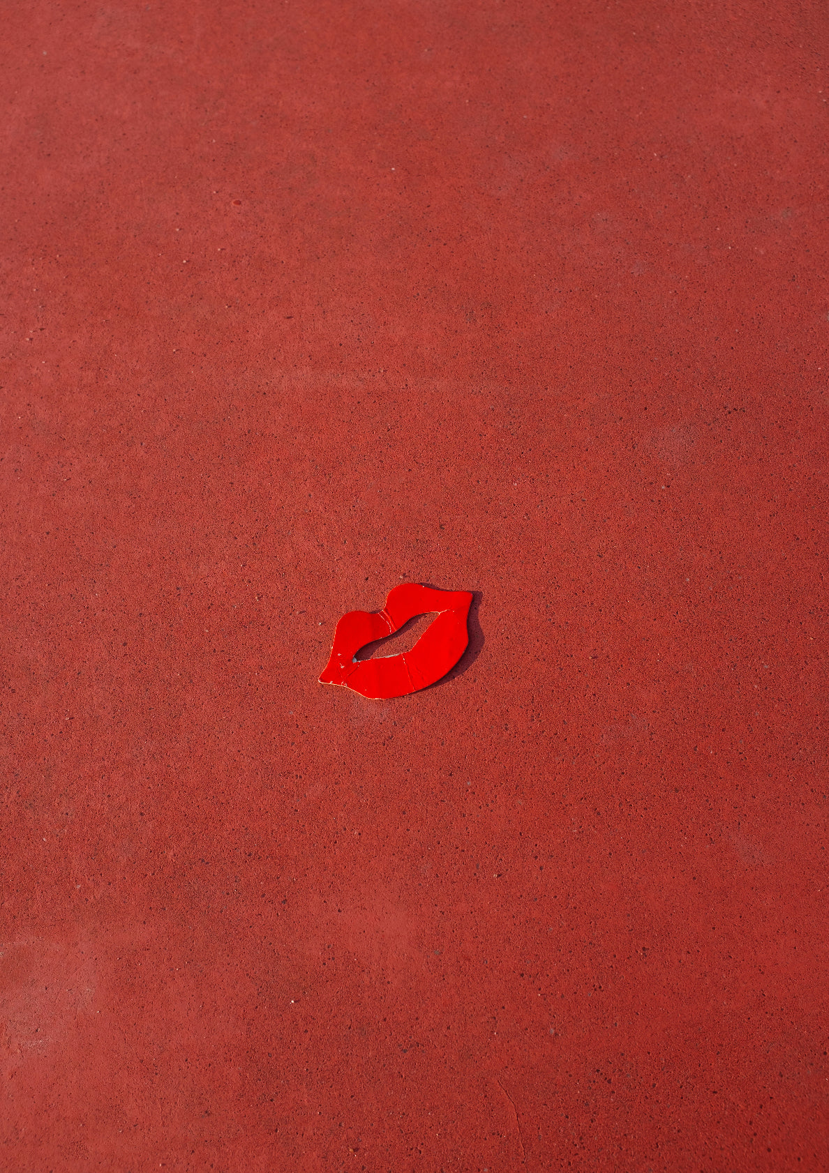 Classic red kiss on a sidewalk / pop art style lips photo print