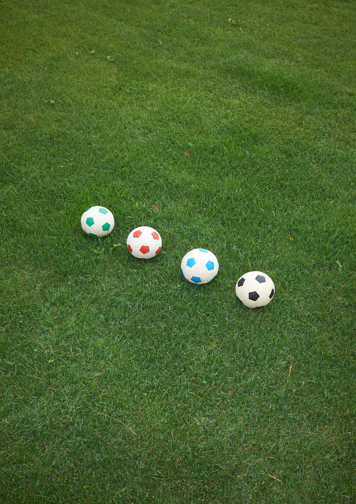 Footballs and soccerballs / minimal style photo print