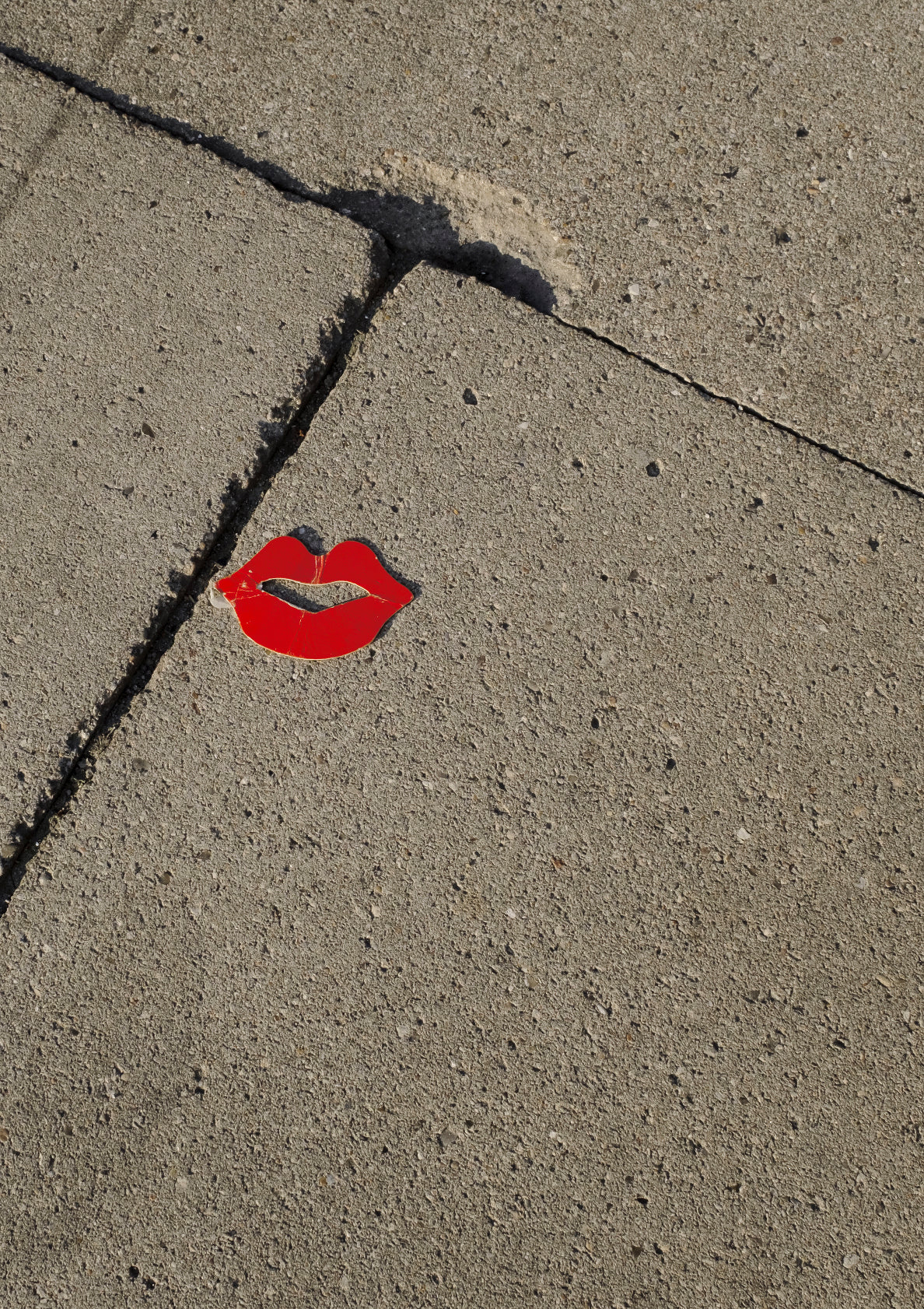 Classic red kiss on a sidewalk / pop art style lips photo print