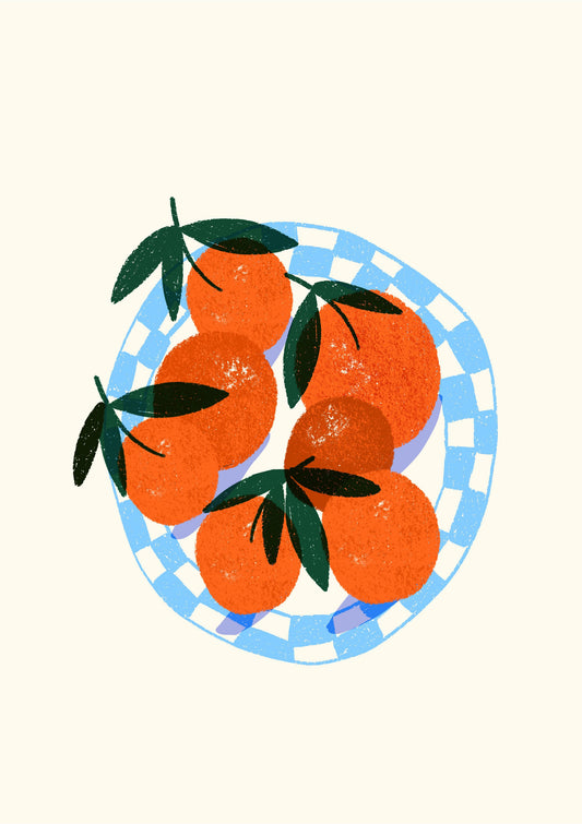 Oranges in a blue plate